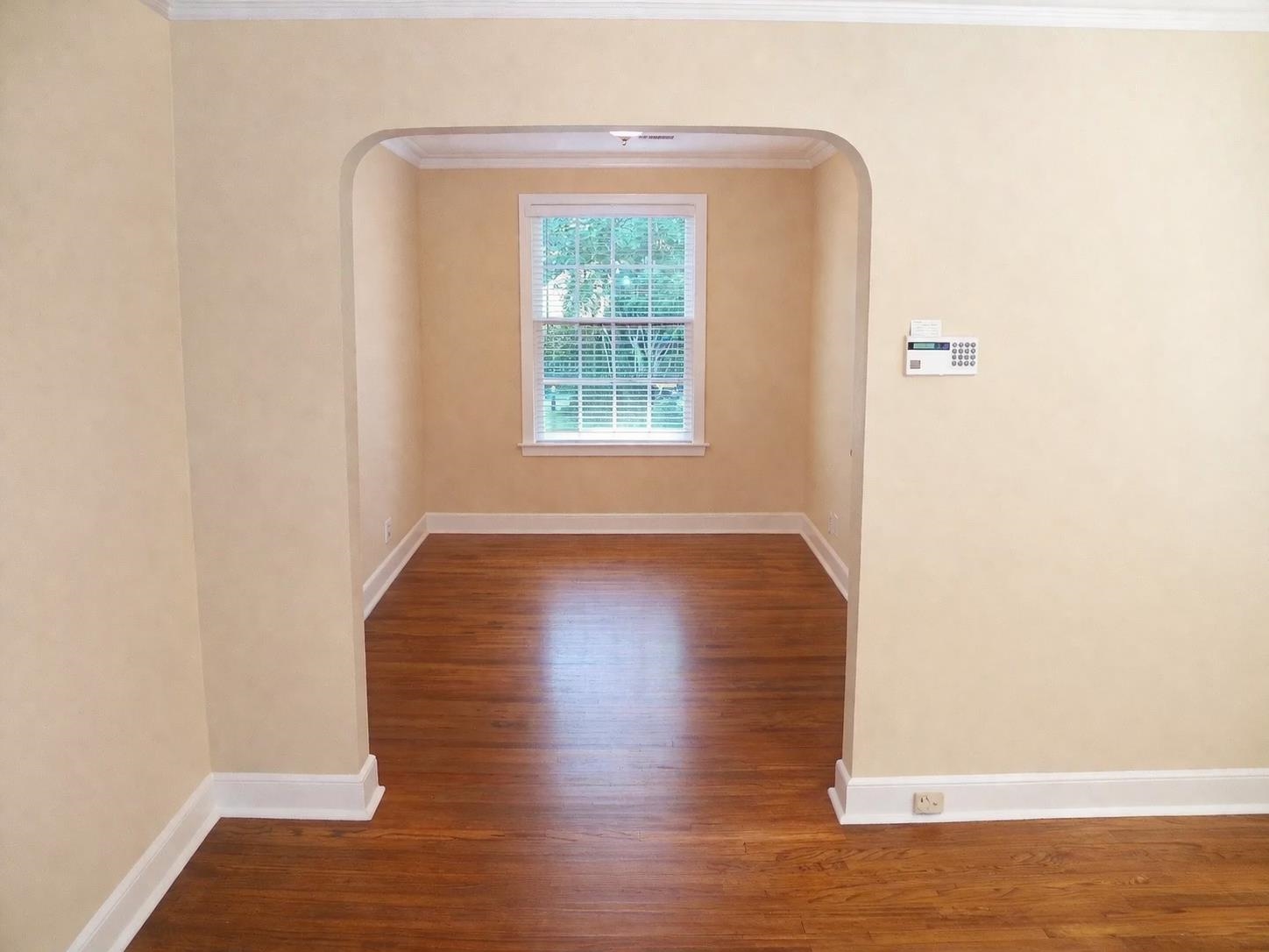 705 Loeb Street Memphis, TN 38111 - Photo 8 of 16 a view of a room with wooden floor and window