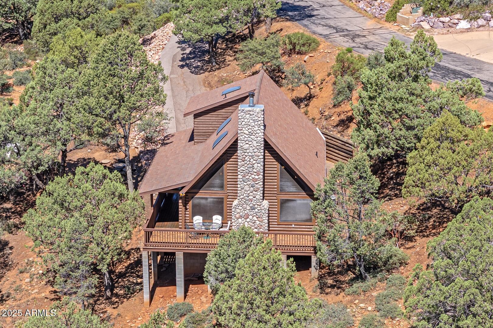 5945 Arroyo Way Pine, AZ 85544 - Photo 1 of 38 a view of a house with a yard