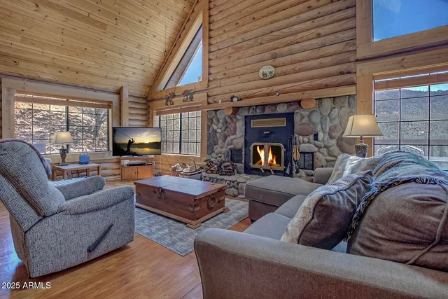 a view of entryway livingroom and hall