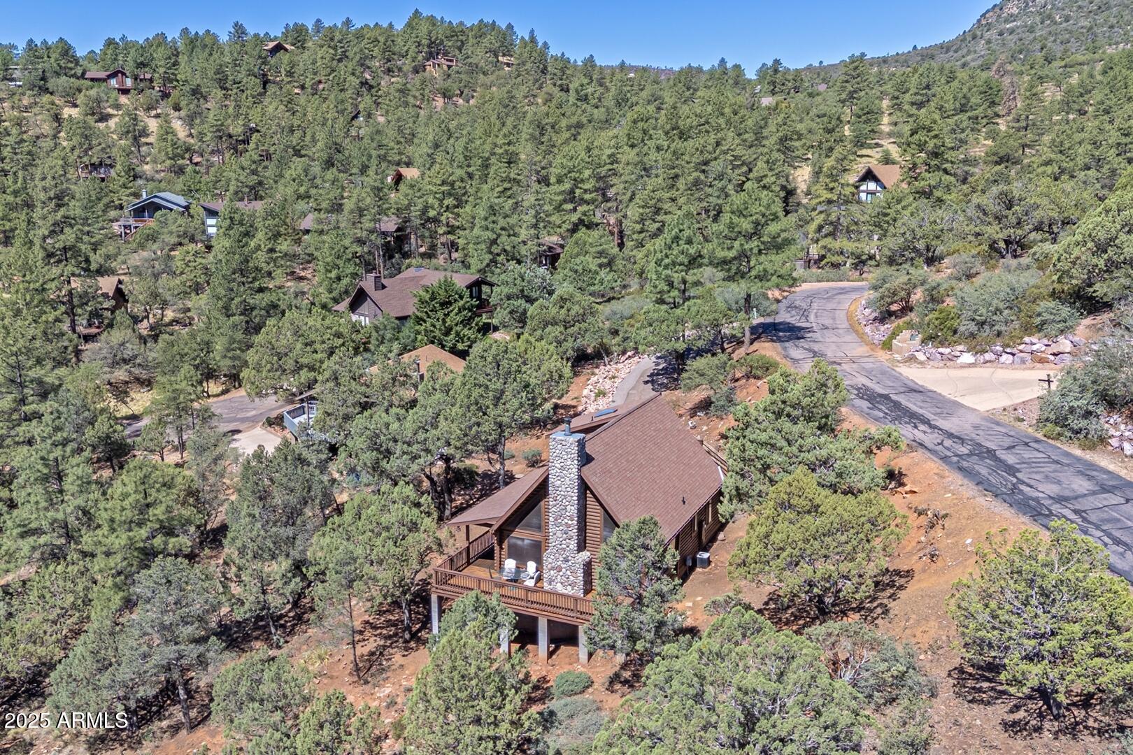 5945 Arroyo Way Pine, AZ 85544 - Photo 33 of 38 an aerial view of a house with a yard