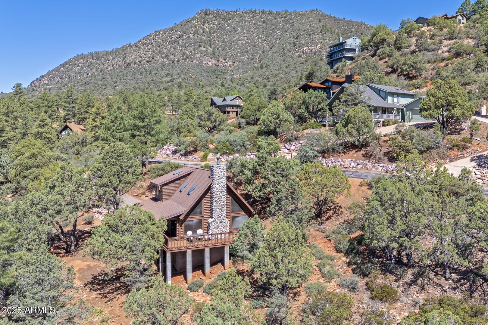 5945 Arroyo Way Pine, AZ 85544 - Photo 34 of 38 an aerial view of a house with a yard