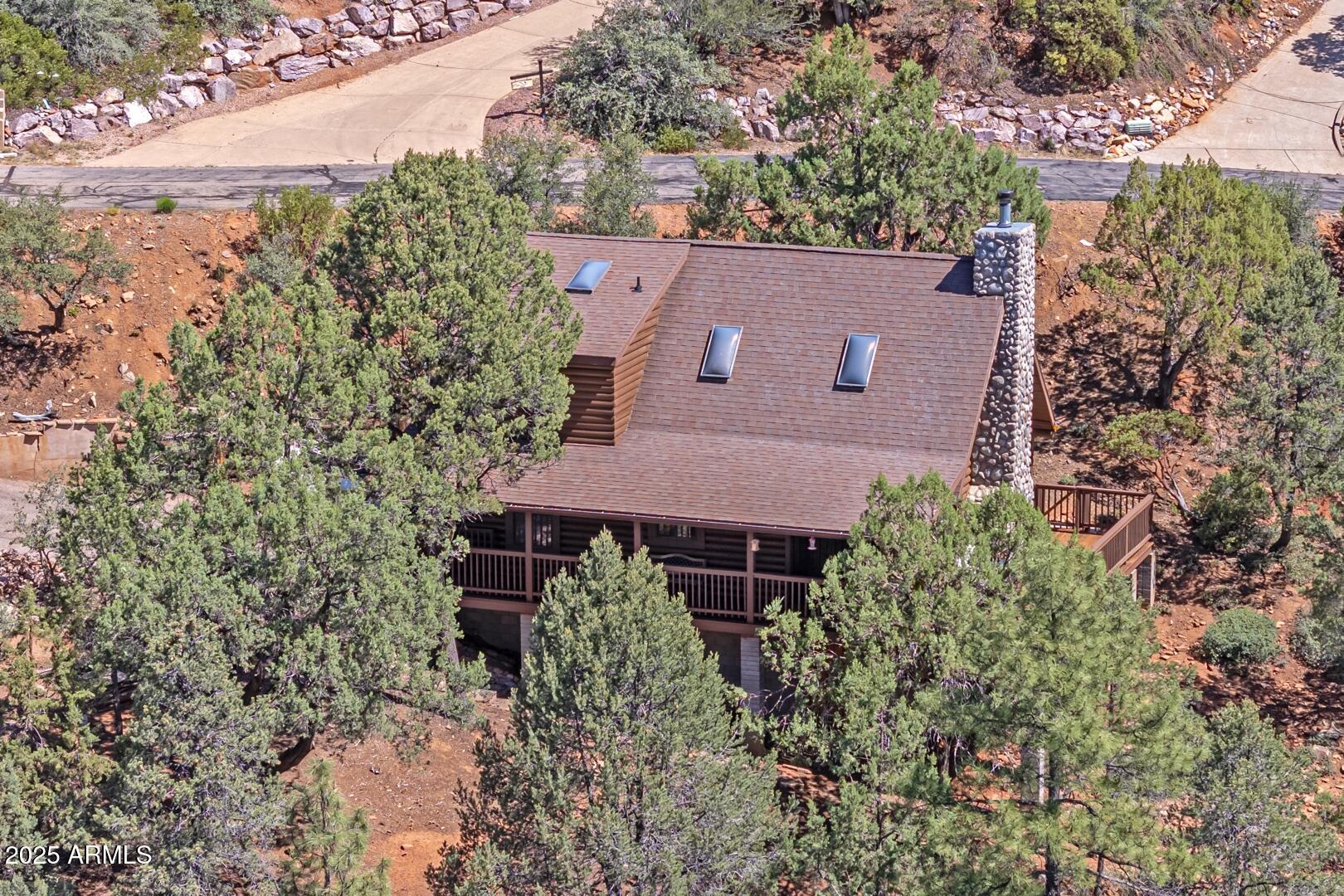 5945 Arroyo Way Pine, AZ 85544 - Photo 35 of 38 front view of a house with a yard