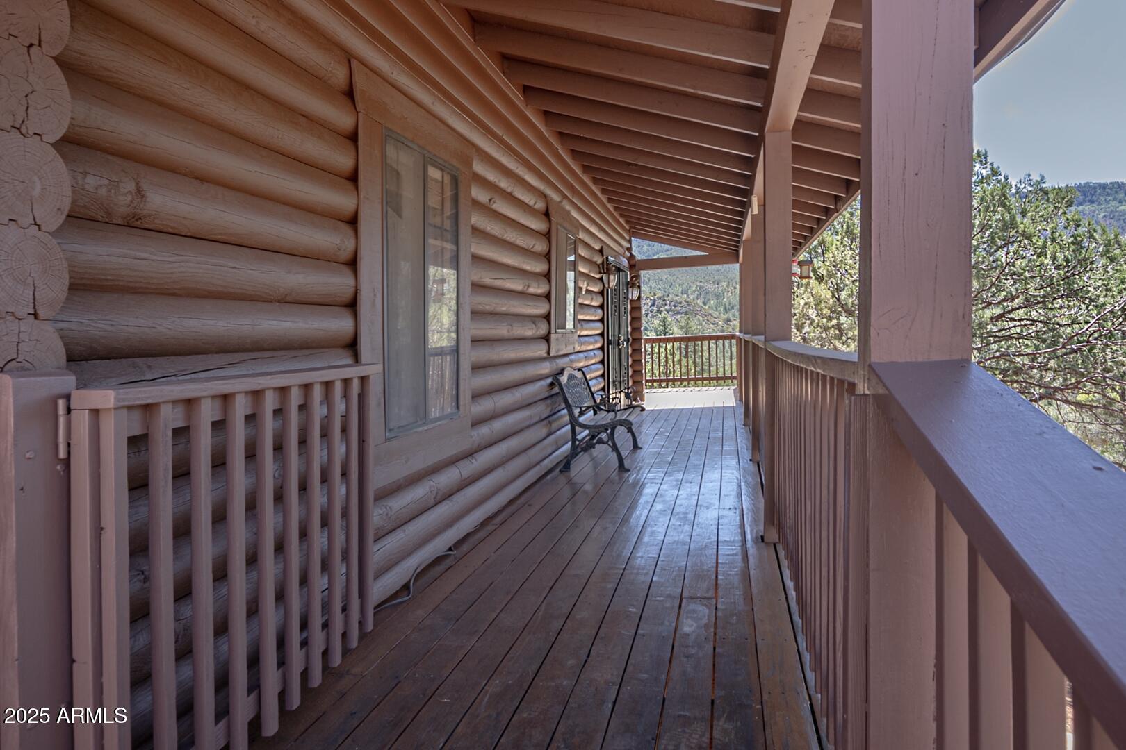 5945 Arroyo Way Pine, AZ 85544 - Photo 4 of 38 a view of wooden balcony
