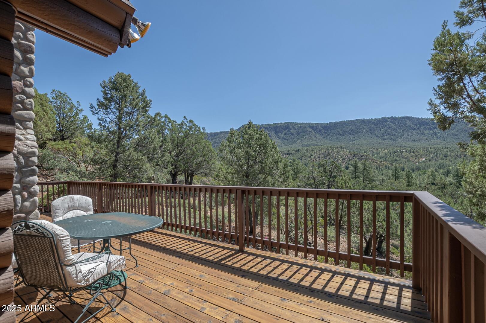 5945 Arroyo Way Pine, AZ 85544 - Photo 10 of 38 a view of a couches in the roof deck