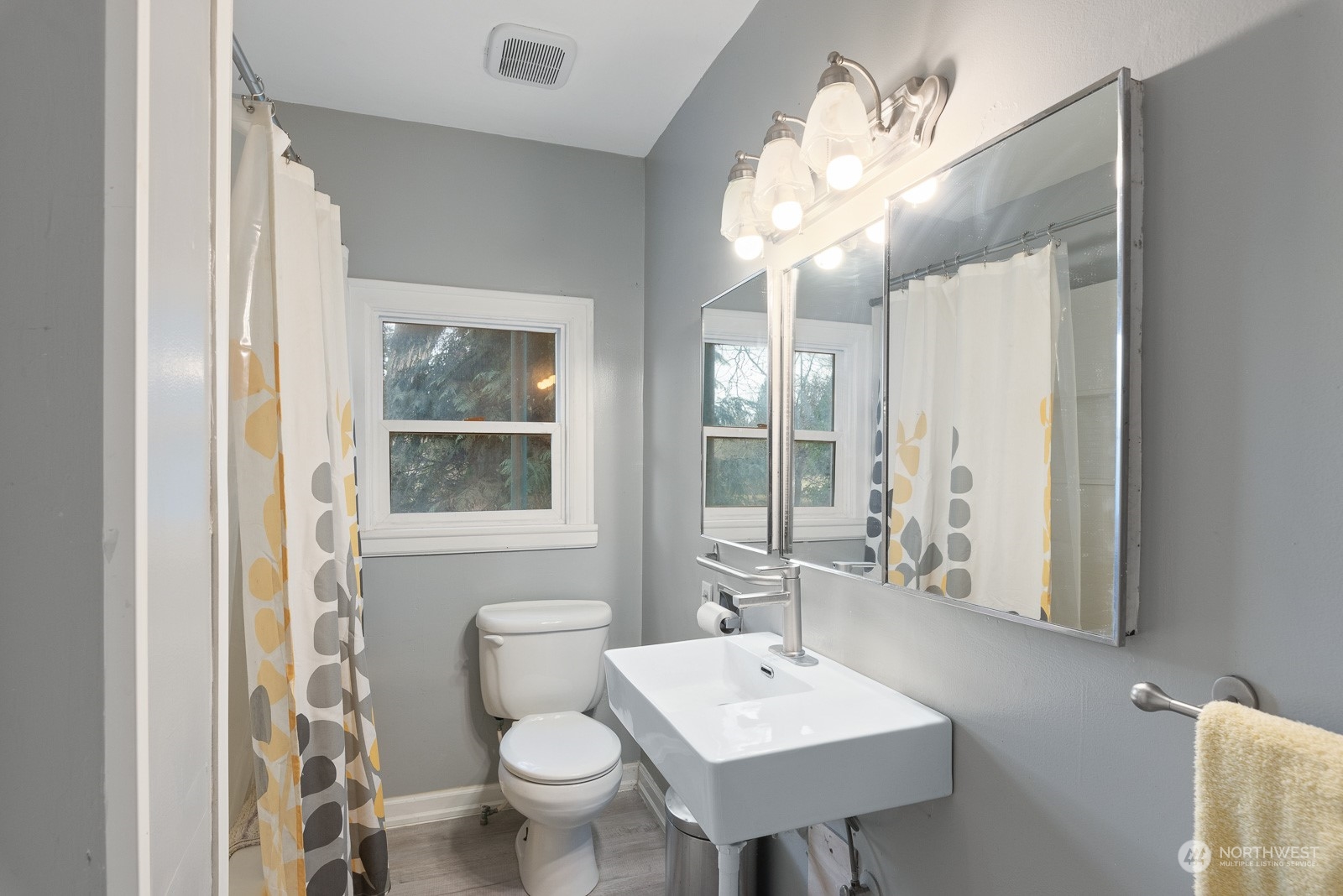 5709 Putnam Road Everson, WA 98247 - Photo 18 of 40 a bathroom with a sink and a mirror