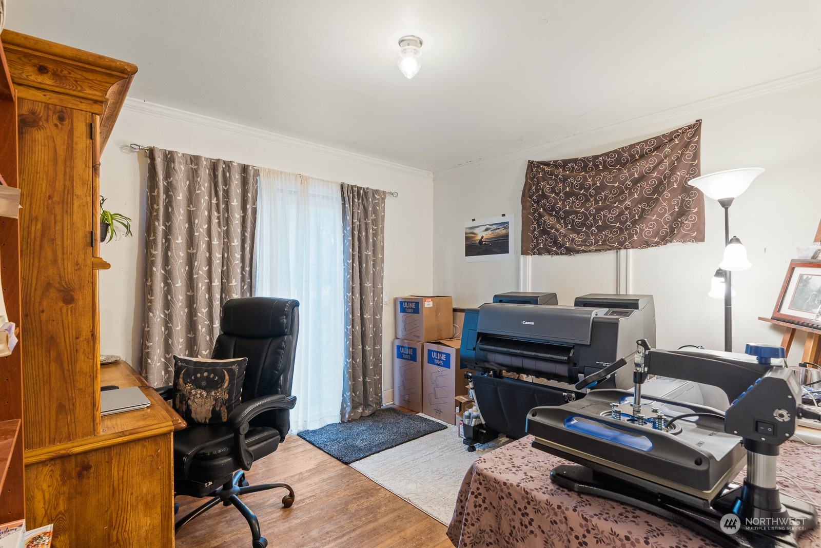 5709 Putnam Road Everson, WA 98247 - Photo 19 of 40 a bedroom with furniture and a flat screen tv