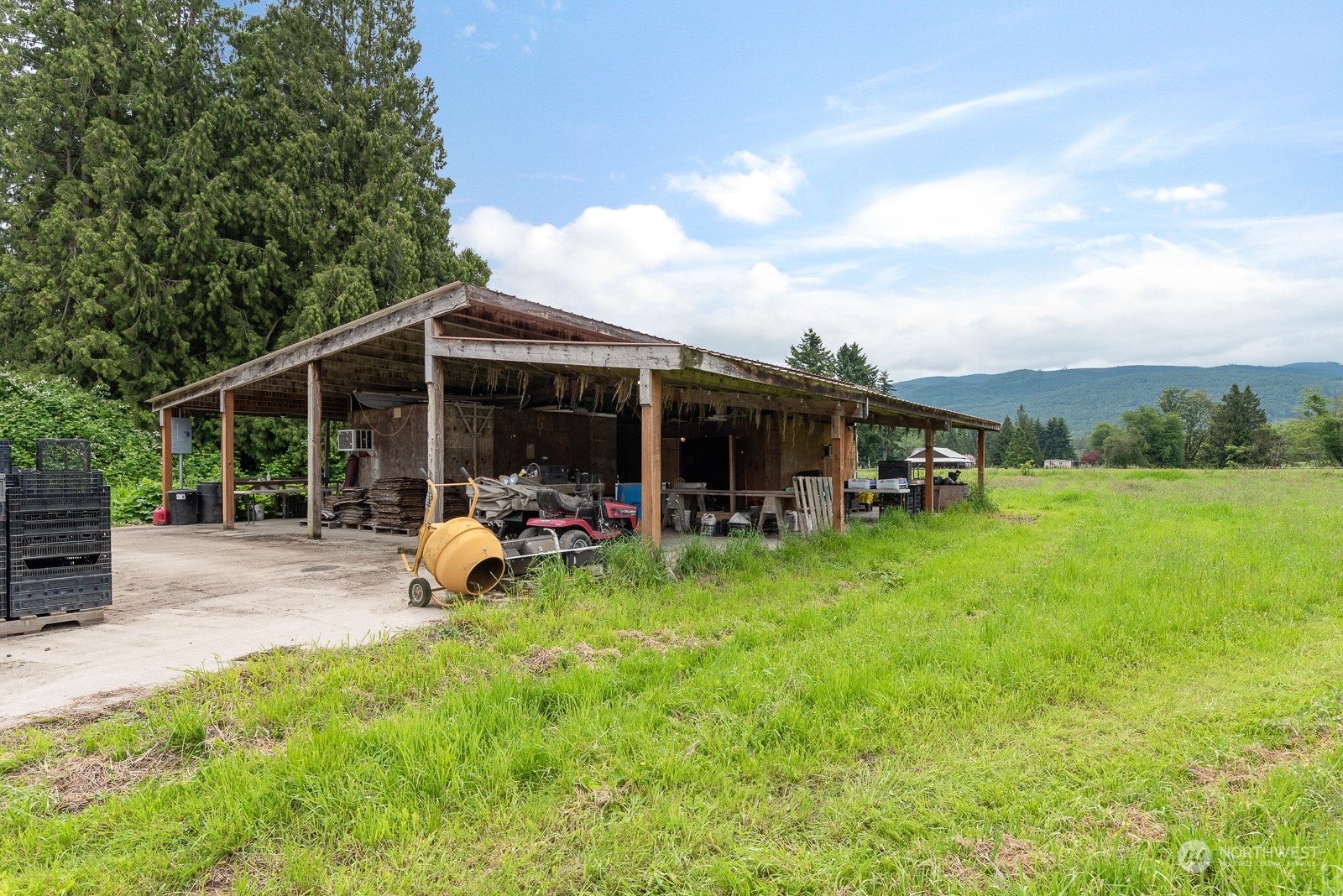 5709 Putnam Road Everson, WA 98247 - Photo 30 of 40 a view of a house with backyard porch and sitting area