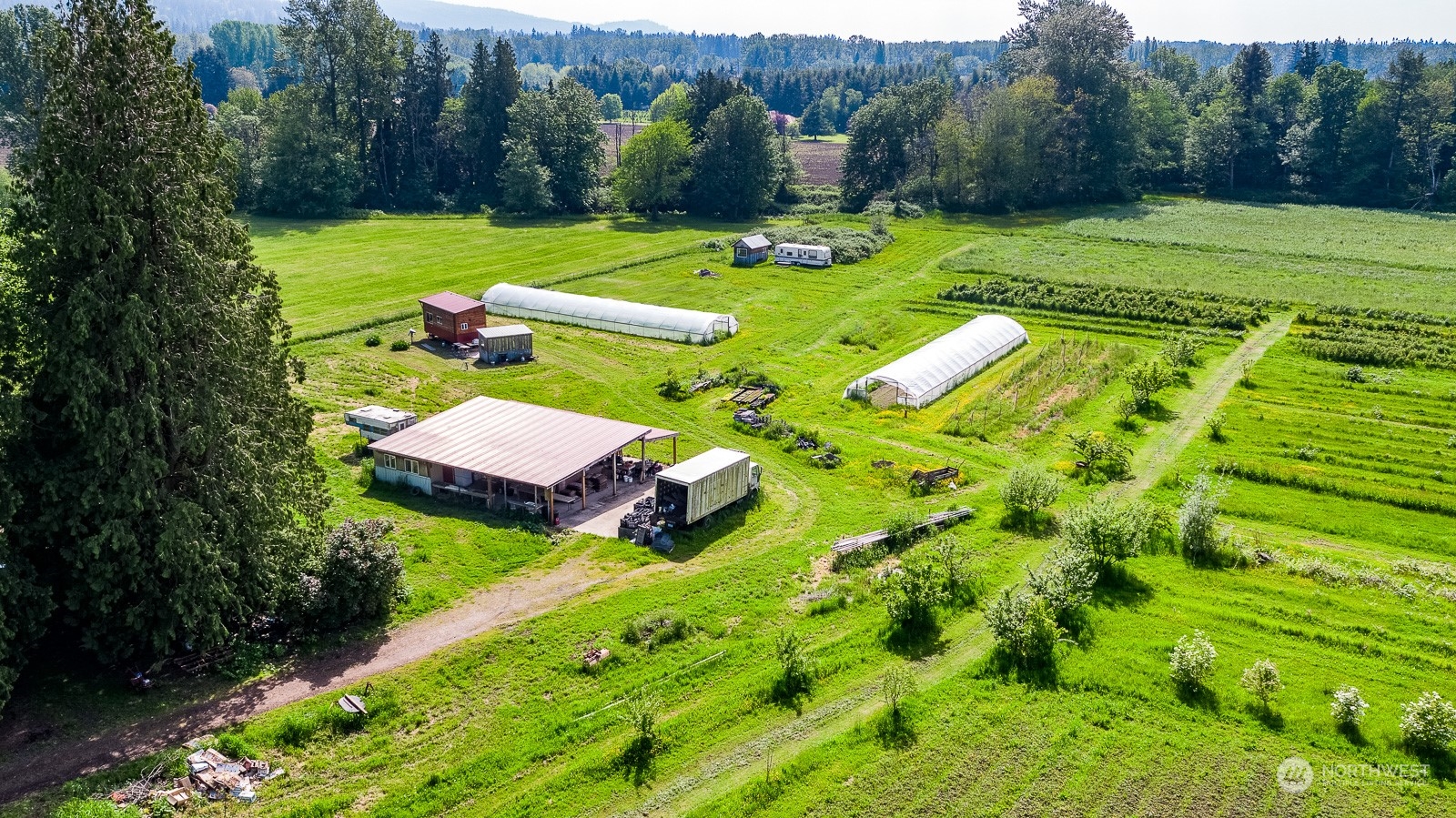 5709 Putnam Road Everson, WA 98247 - Photo 4 of 40 a view of a golf course with chairs