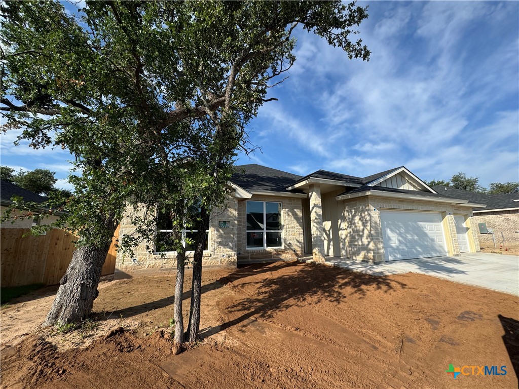 1319 Rylee Lane Salado, TX 76571 - Photo 2 of 17 a front view of a house with a yard