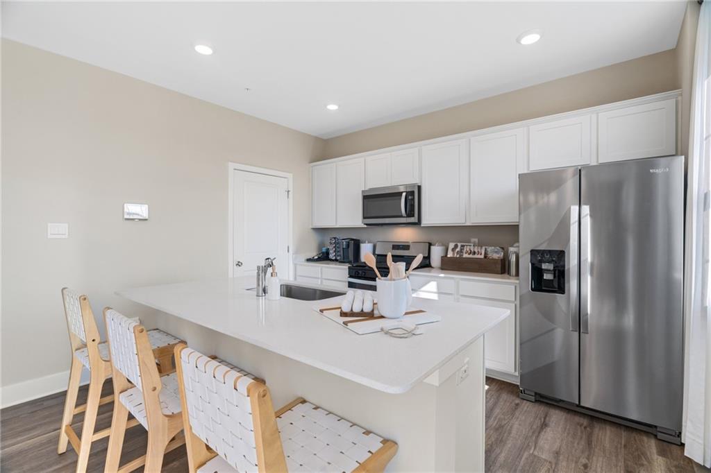 1094 Peachtree Road Carnegie, PA 15106 - Photo 7 of 22 a kitchen with stainless steel appliances a refrigerator sink and microwave