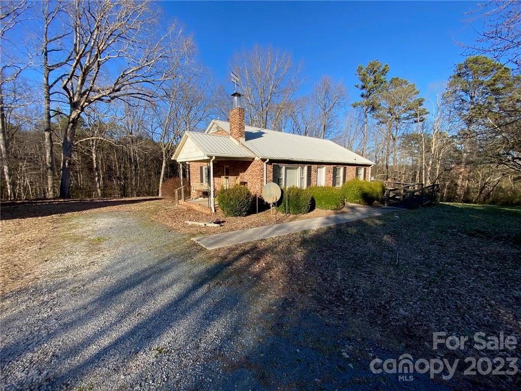 430 Russell Road Polkton, NC 28135 - Photo 5 of 18 a front view of a house with a yard