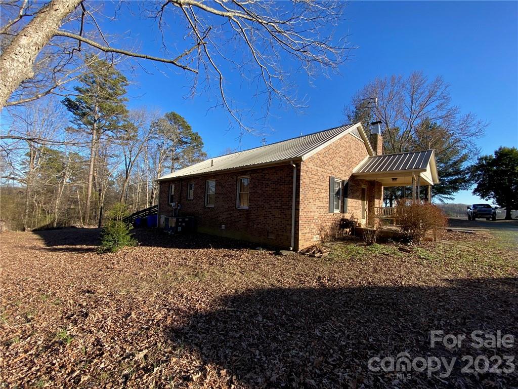 430 Russell Road Polkton, NC 28135 - Photo 7 of 18 a front view of a house with a yard