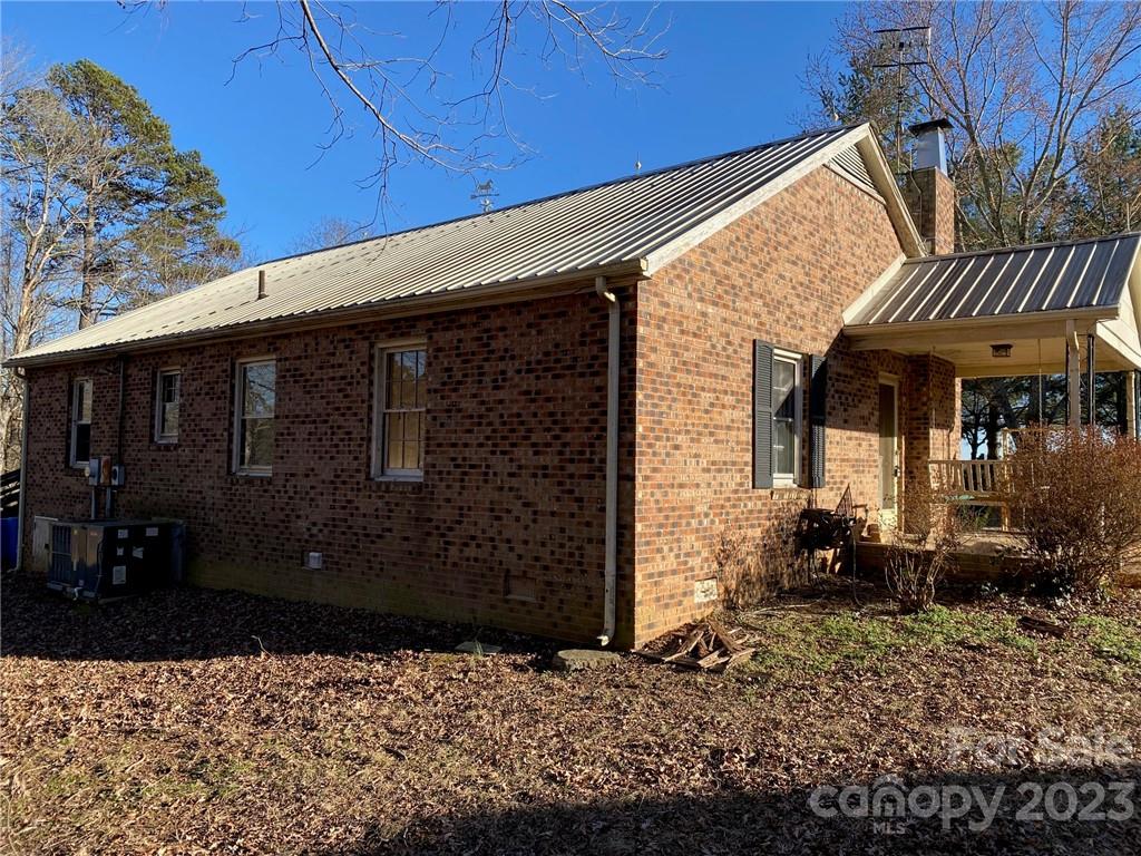 430 Russell Road Polkton, NC 28135 - Photo 8 of 18 a front view of a house with garden