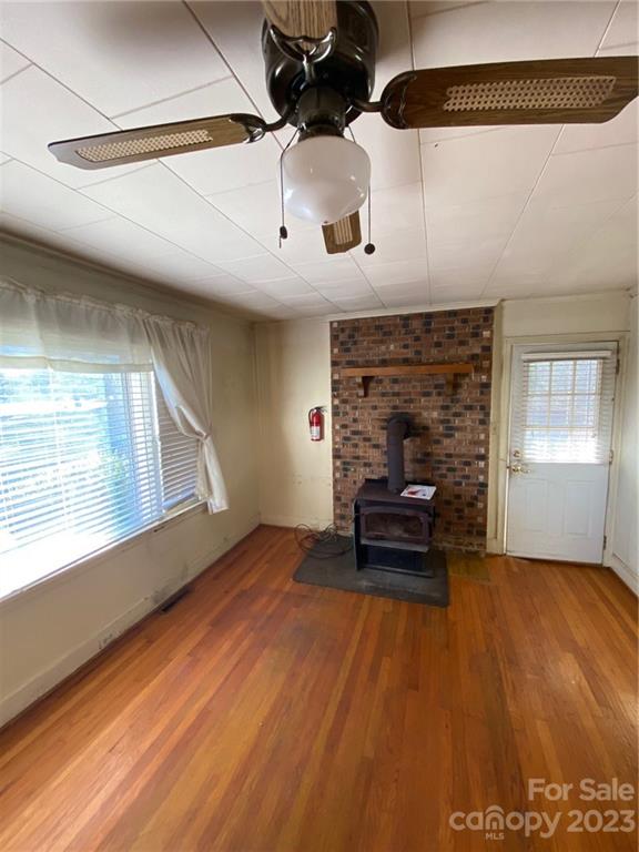 430 Russell Road Polkton, NC 28135 - Photo 10 of 18 a living room with furniture and a fireplace