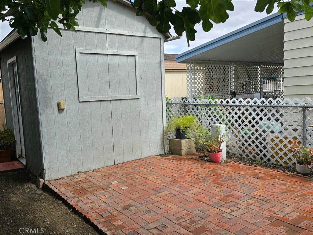 32900 Riverside Drive, Unit 94 Lake Elsinore, CA 92530 - Photo 22 of 23 Backyard Brick Patio