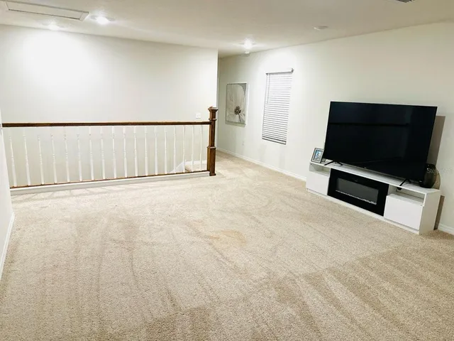 a view of a livingroom with furniture