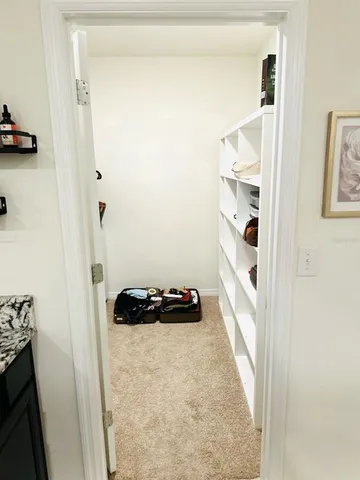 a bathroom with a sink and a window