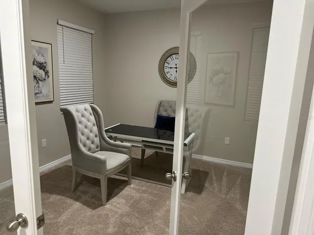 a view of a hallway with elevator