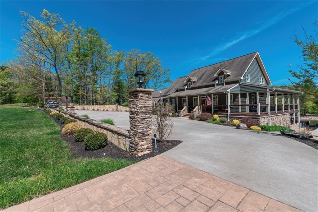 69 Winding Ridge Blairsville, GA 30512 - Photo 16 of 17 a view of a house with backyard sitting area and garden