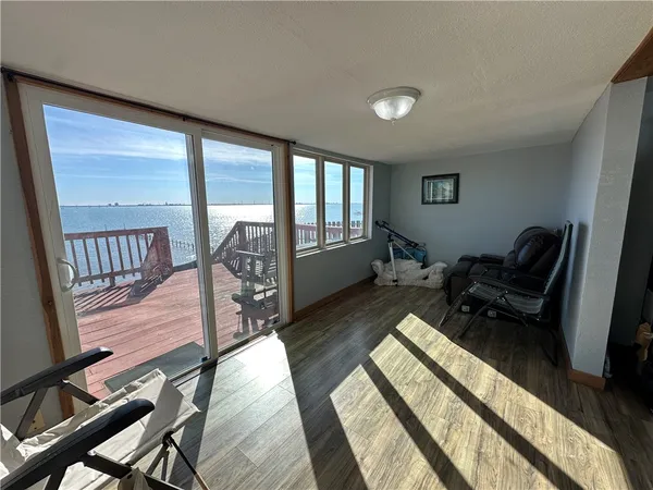 a view of a living room and dining room