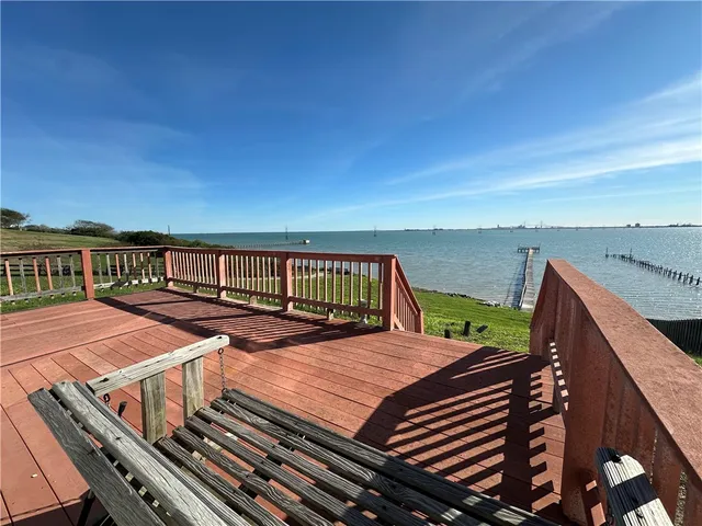 a view of balcony with furniture