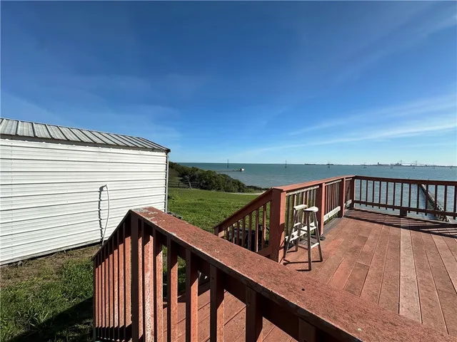 a view of a terrace with a yard