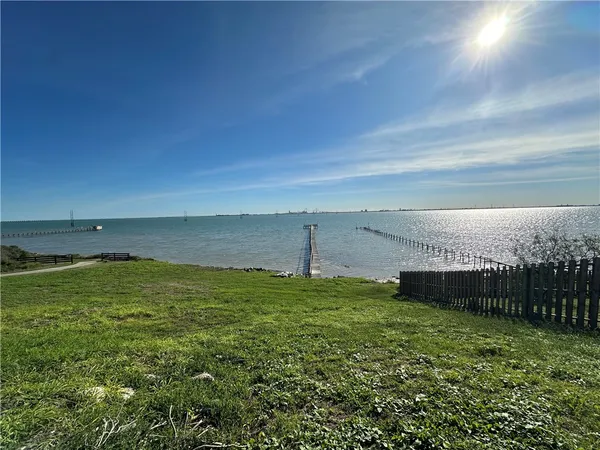 a view of a ocean with a big yard