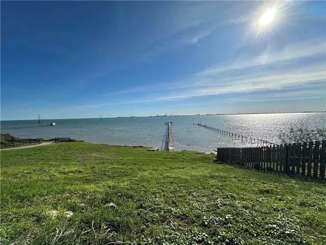 a view of a ocean with a big yard