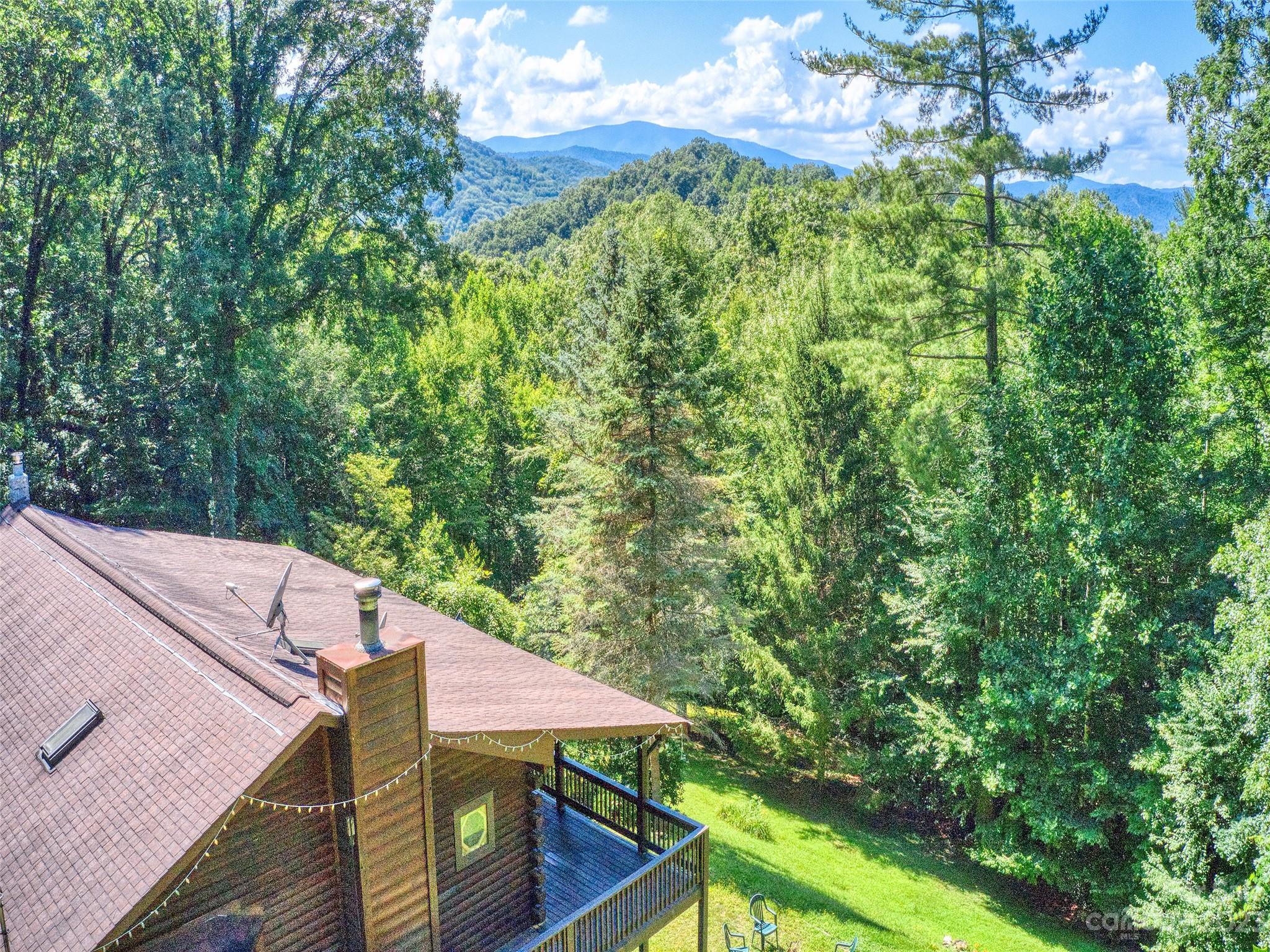 28 Honeybear Lane Clyde, NC 28721 - Photo 2 of 43 a view of a balcony with an outdoor space