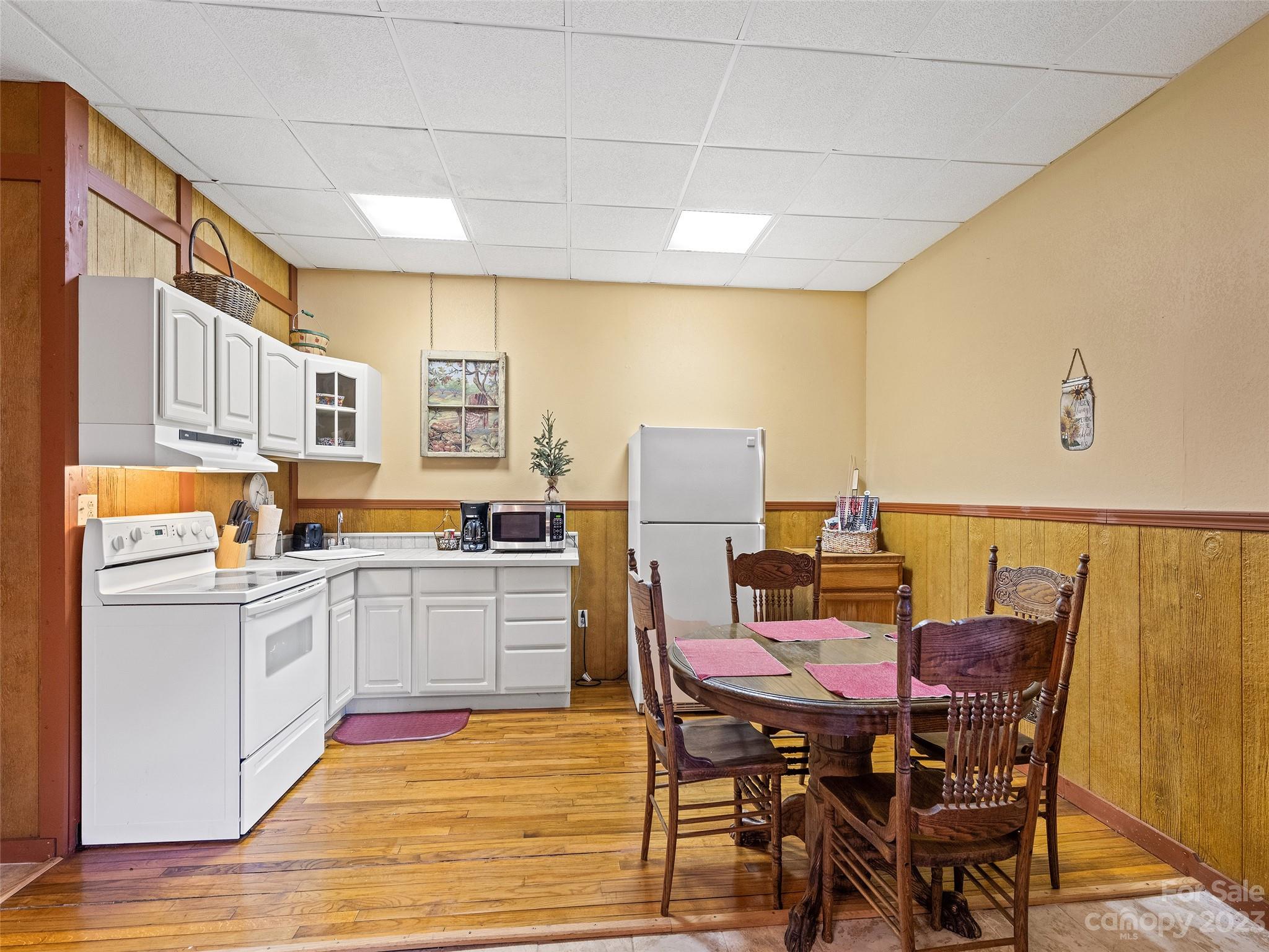 28 Honeybear Lane Clyde, NC 28721 - Photo 28 of 43 a view of a dining room with furniture and chandelier
