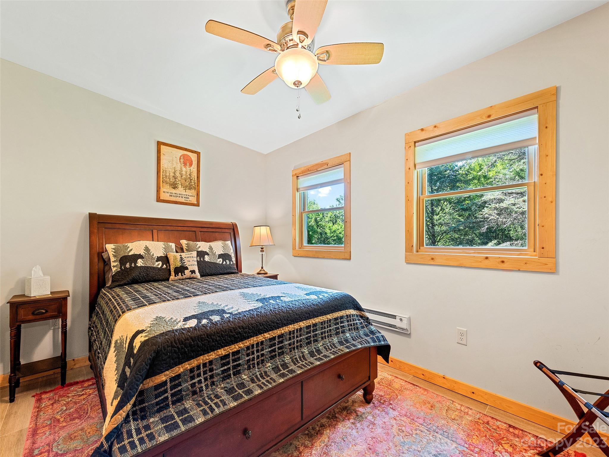 28 Honeybear Lane Clyde, NC 28721 - Photo 32 of 43 a bedroom with a bed and a window