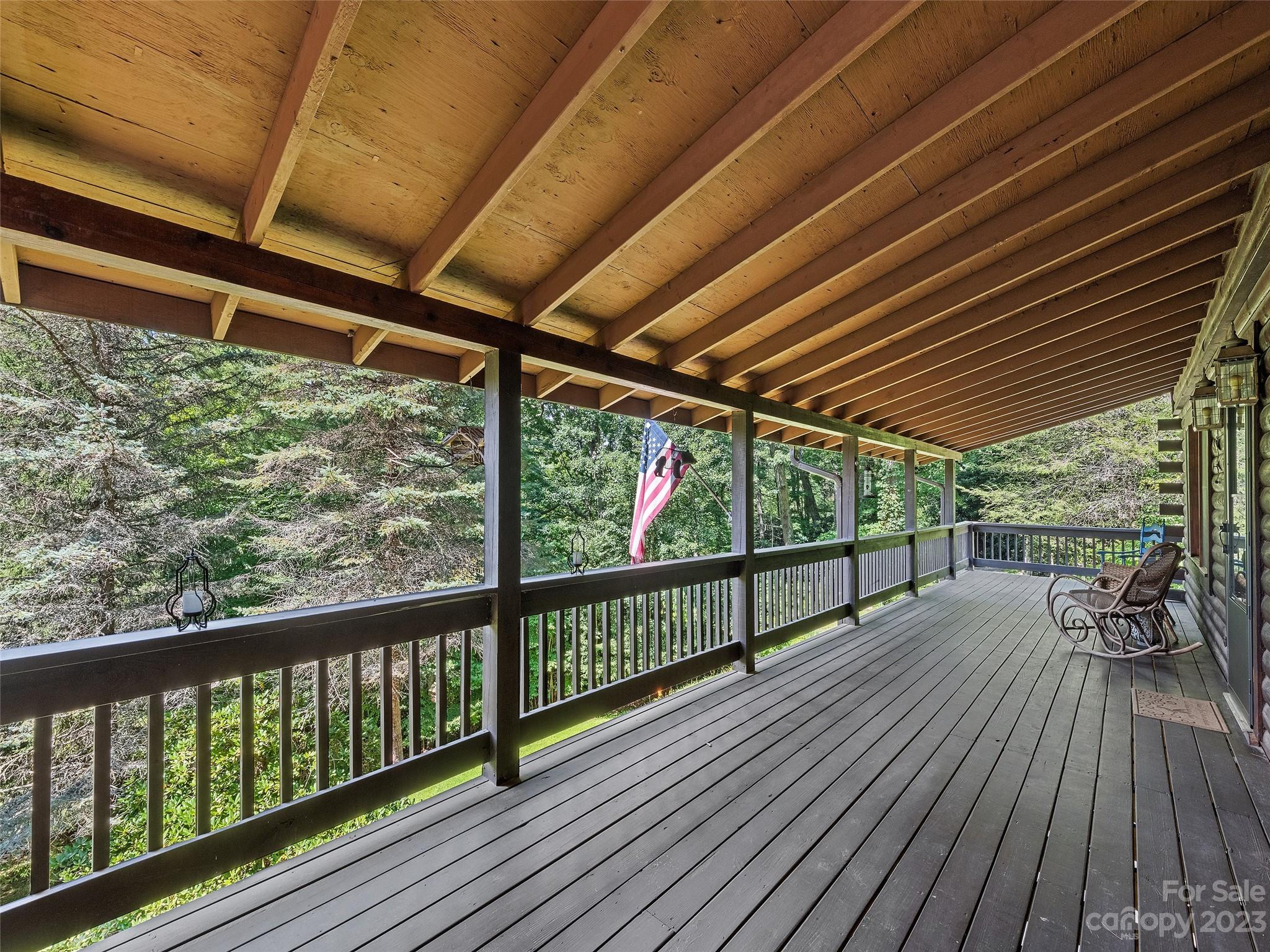 28 Honeybear Lane Clyde, NC 28721 - Photo 37 of 43 a view of porch with deck and wooden floor