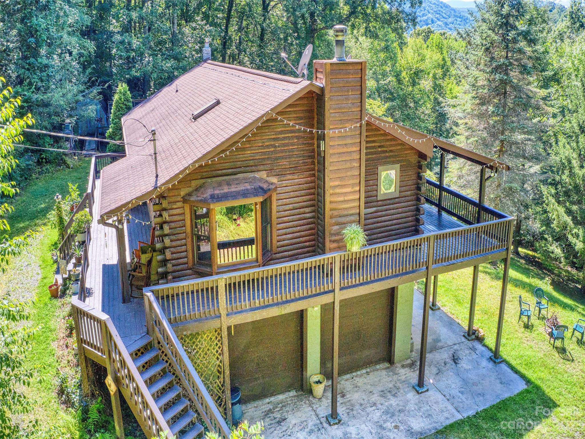 28 Honeybear Lane Clyde, NC 28721 - Photo 41 of 43 a view of a house with a balcony