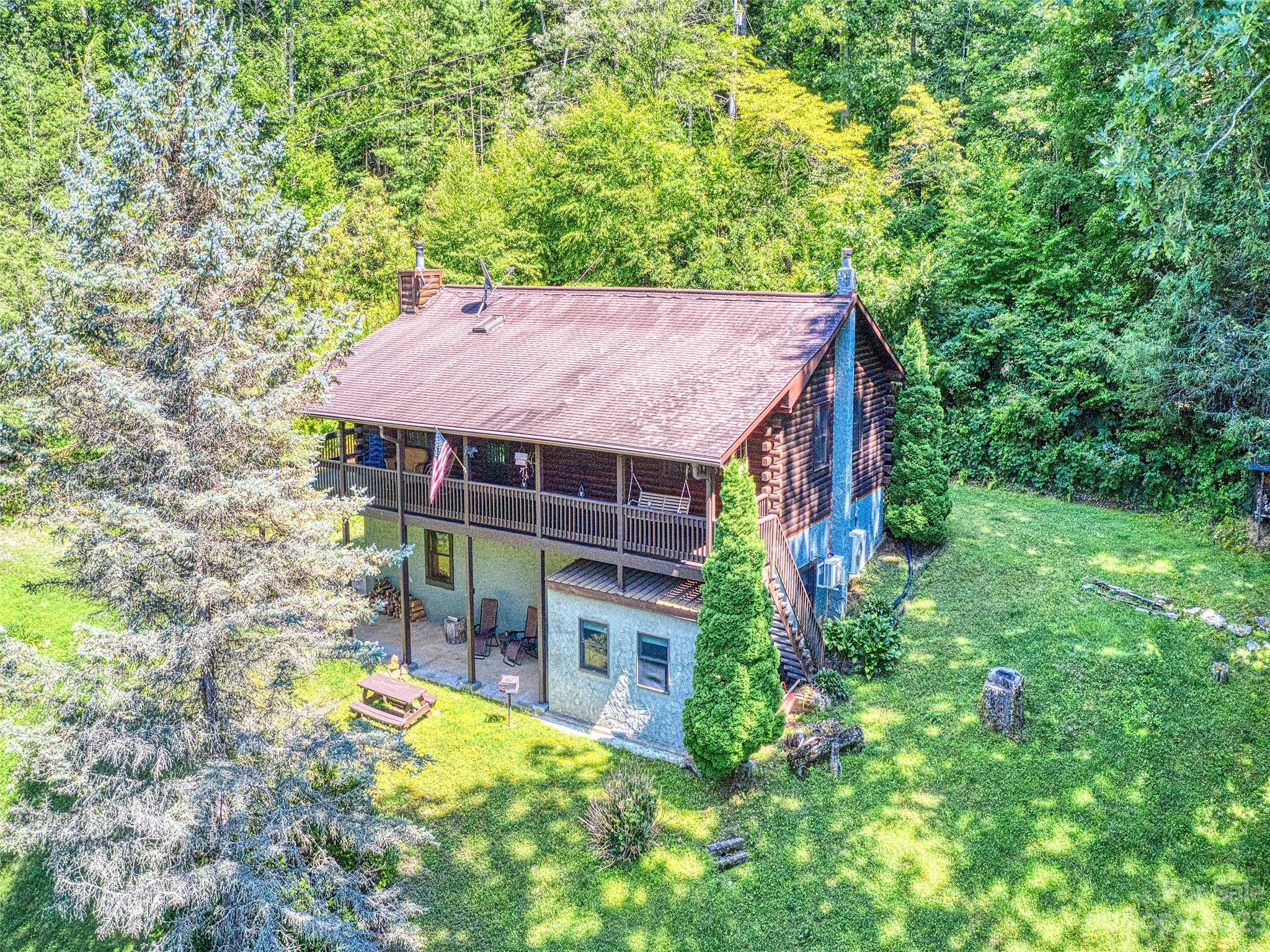 28 Honeybear Lane Clyde, NC 28721 - Photo 43 of 43 a view of house with a garden