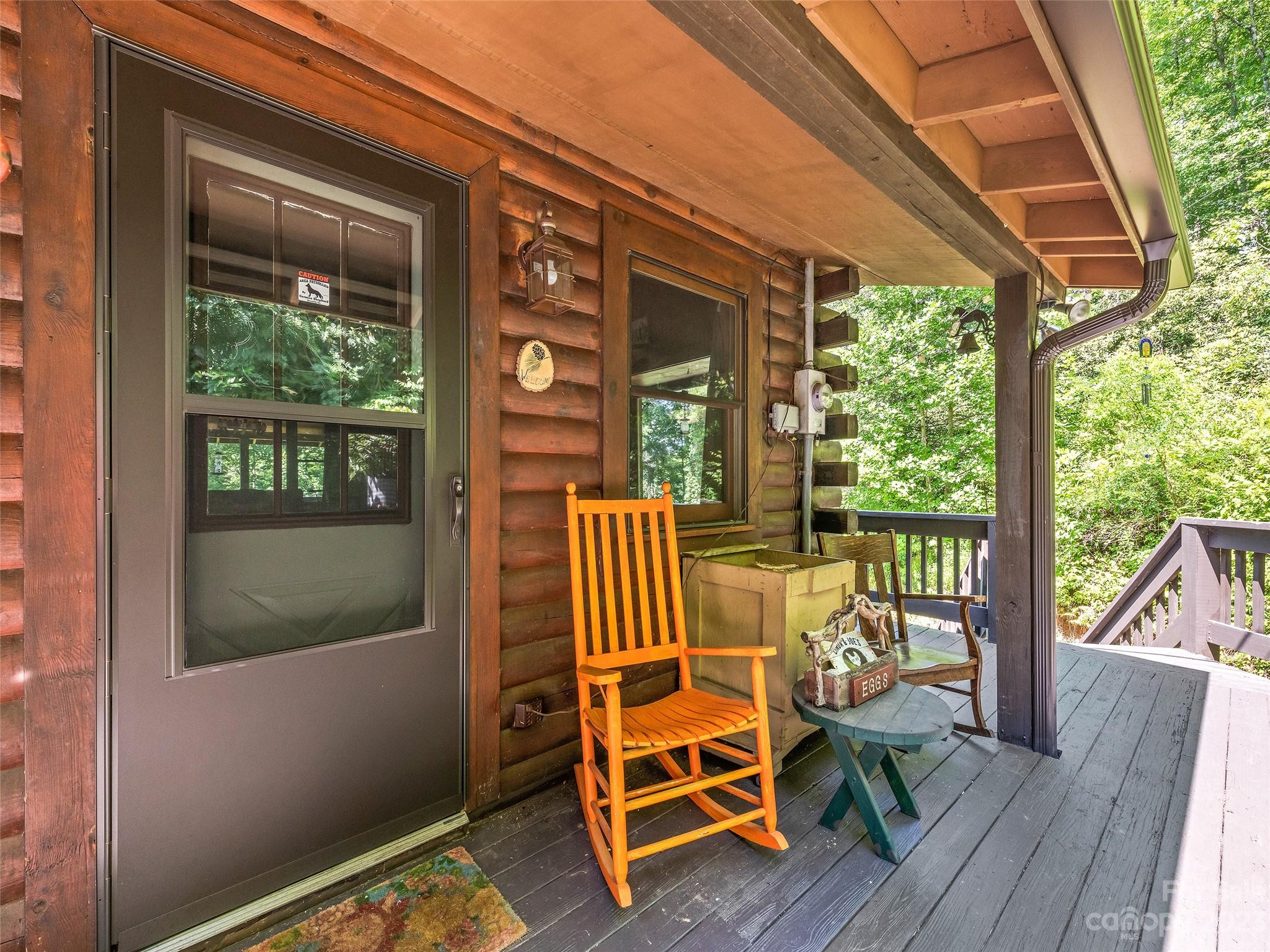 28 Honeybear Lane Clyde, NC 28721 - Photo 7 of 43 a view of a two chair in the balcony