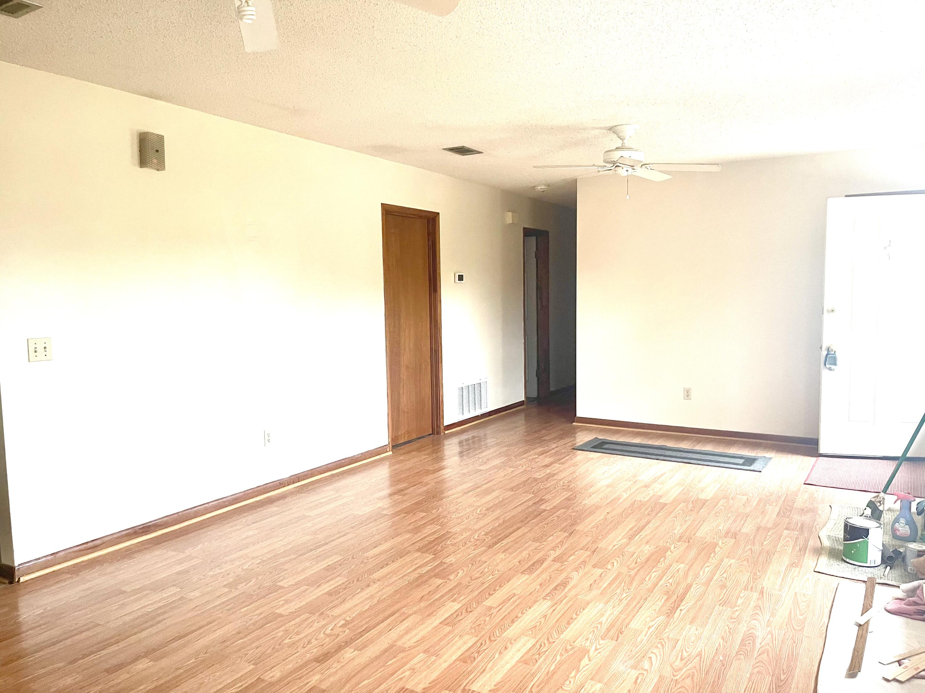 246 Ridge Lake Road Crestview, FL 32536 - Photo 12 of 17 a view of a room with wooden floor