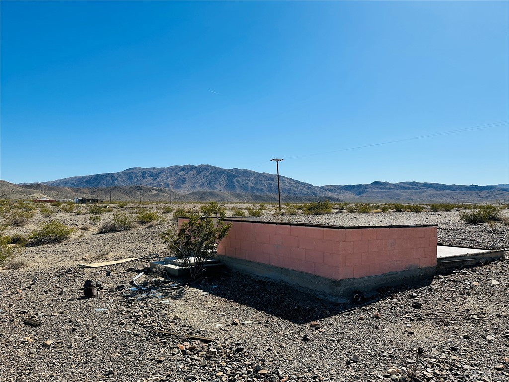 5 Sullivan Road Twentynine Palms, CA 92277 - Photo 12 of 21 a view of a terrace with a mountain