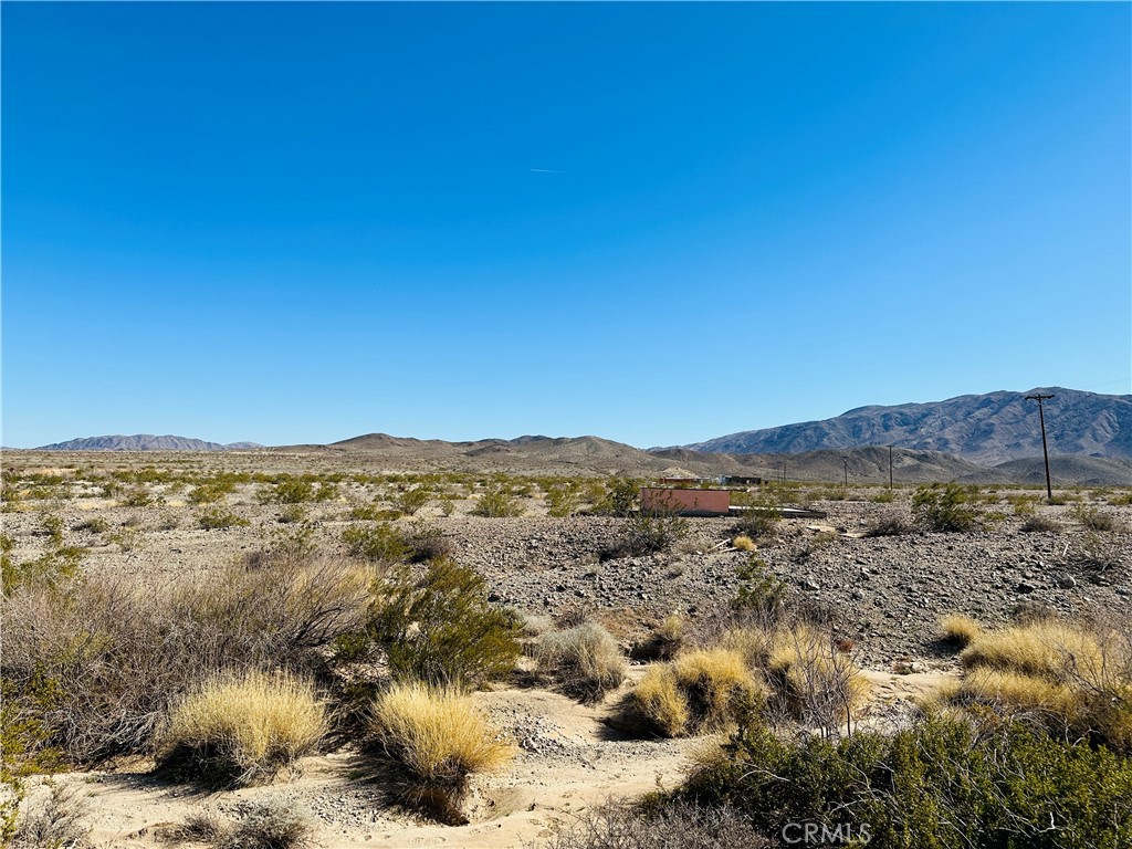 5 Sullivan Road Twentynine Palms, CA 92277 - Photo 9 of 21 a view of a city with mountains in the background