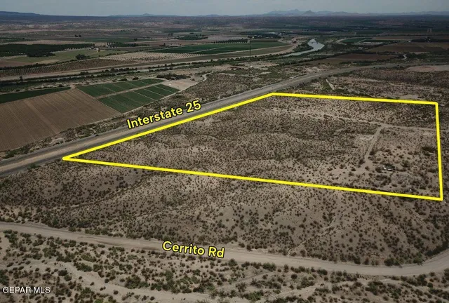 a view of a swimming pool and an outdoor space