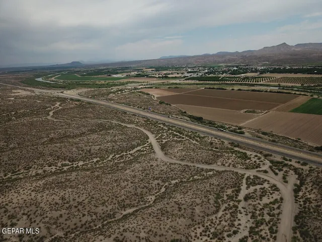 a picture of a room with a white wall and a picture