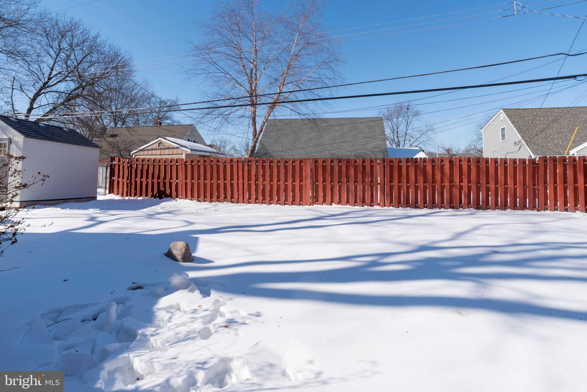 49 Ice Pond Road Levittown, PA 19057 - Photo 22 of 24 Backyard with Privacy Fence, Shed, and Patio
