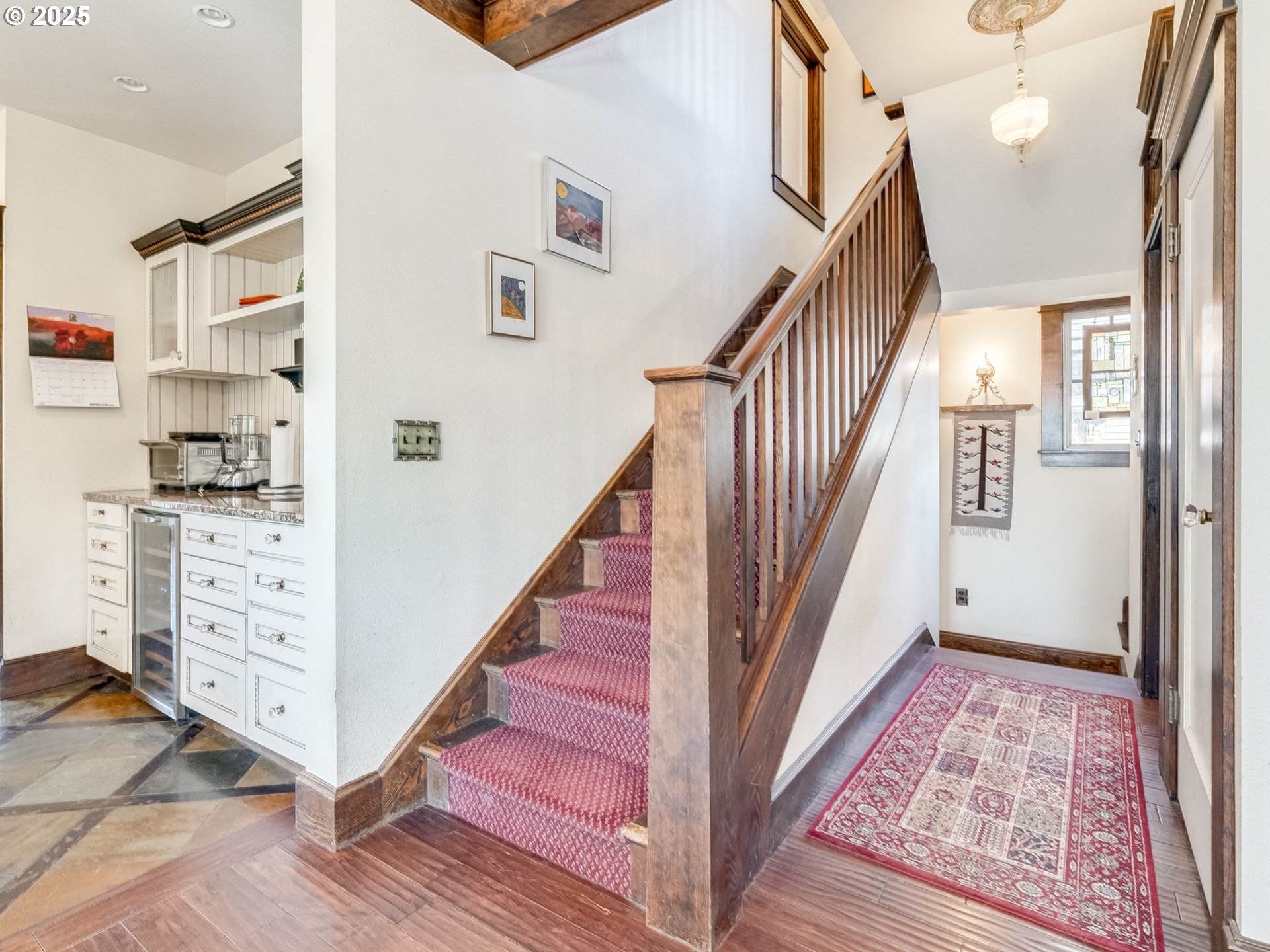 2400 H Street Vancouver, WA 98663 - Photo 26 of 48 a view of hallway with stairs and wooden floor