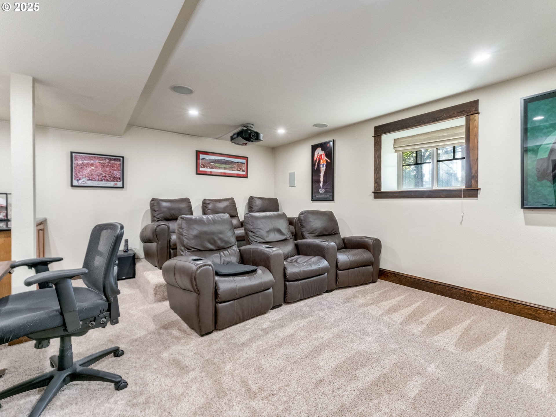 2400 H Street Vancouver, WA 98663 - Photo 39 of 48 a living room with furniture and a bookshelf
