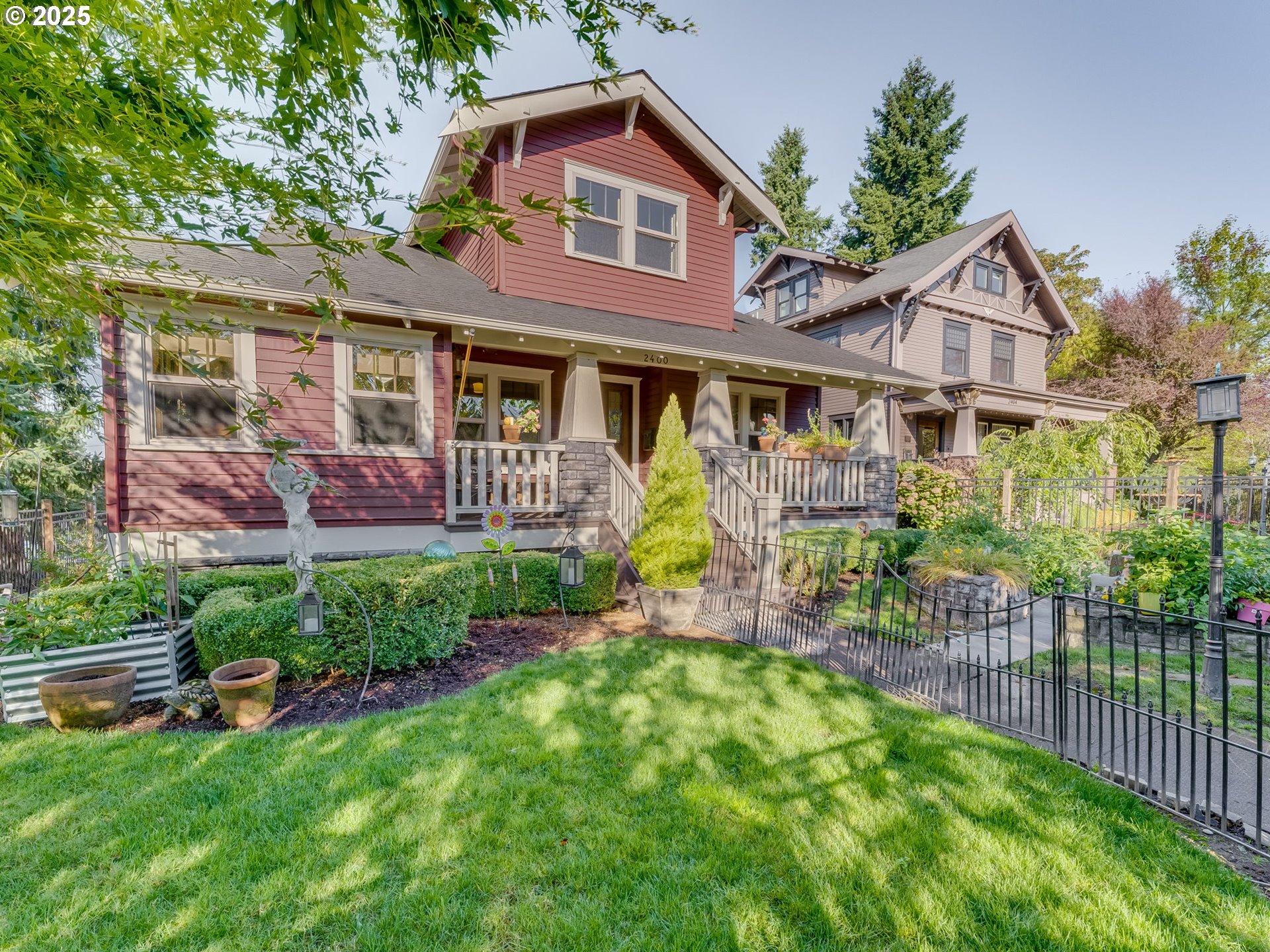 2400 H Street Vancouver, WA 98663 - Photo 48 of 48 a front view of a house with a garden and plants