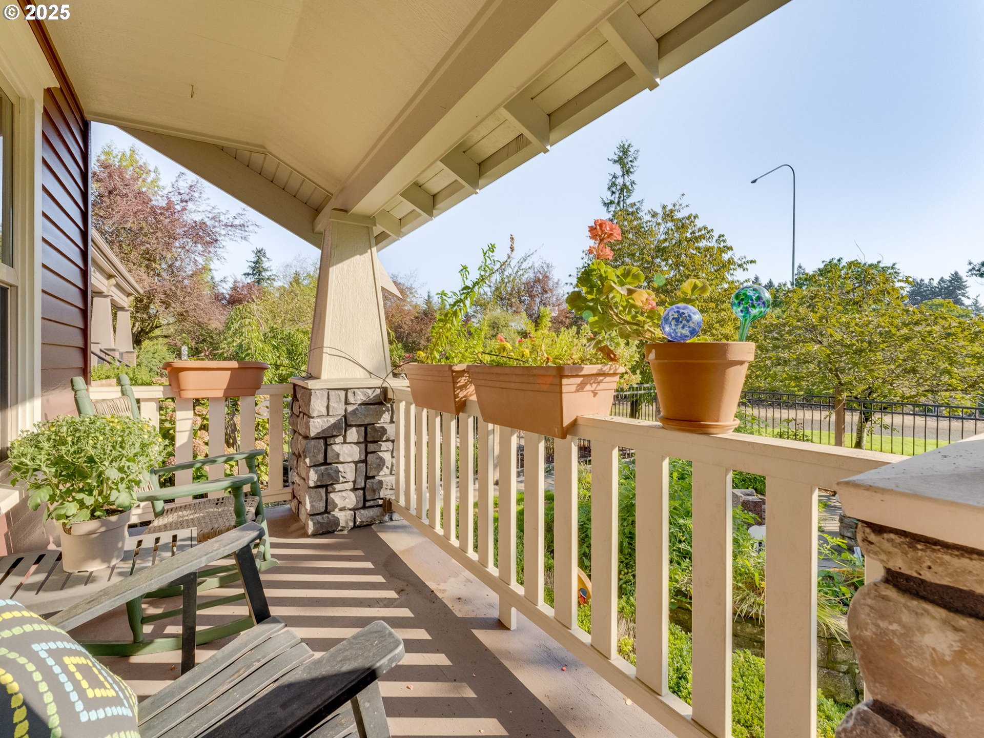 2400 H Street Vancouver, WA 98663 - Photo 6 of 48 a view of a porch with a table and chairs