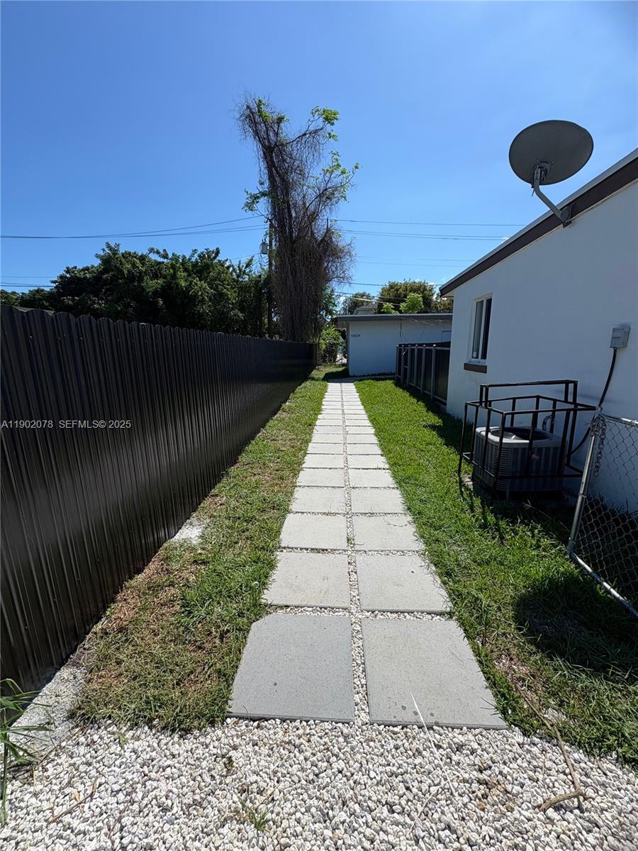 10020 Southwest 171st Street Miami, FL 33157 - Photo 17 of 18 a view of a backyard