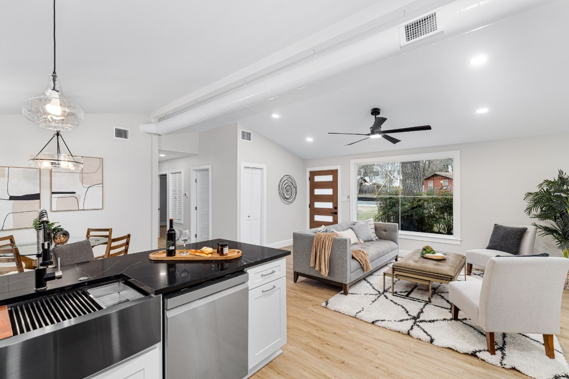 5605 Overbrook Drive Austin, TX 78723 - Photo 14 of 37 a living room with furniture and a large window