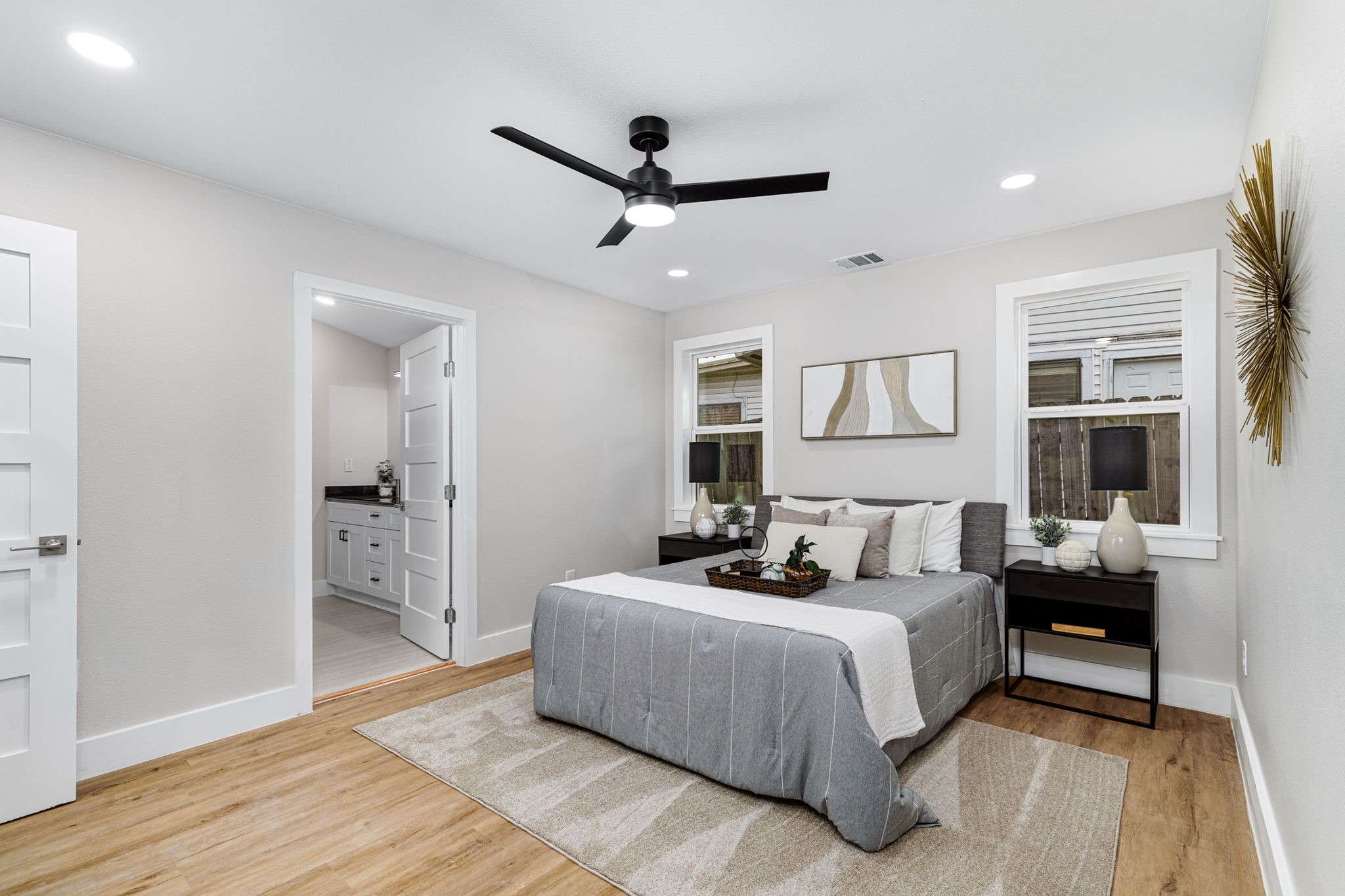 5605 Overbrook Drive Austin, TX 78723 - Photo 16 of 37 a bedroom with a bed and window