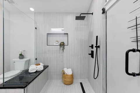 a bathroom with a bath tub