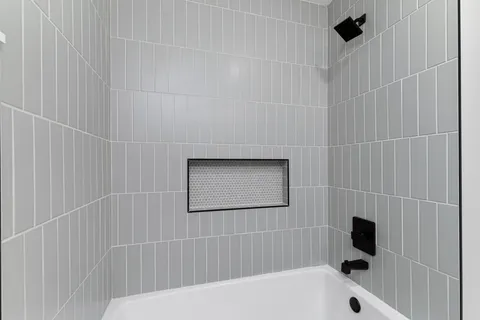 a bathroom with a bathtub